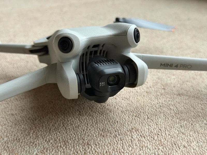 DJI Mini 4 Pro drone with front camera gimbal, light gray body