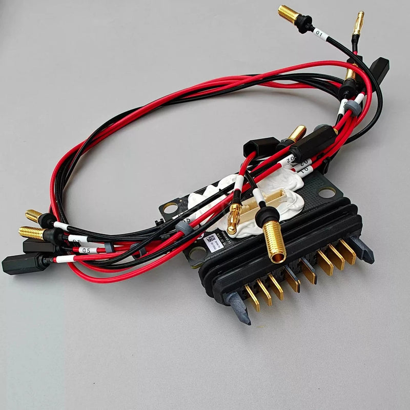 DJI Agras T20 power distribution board with red wiring and gold pin connectors