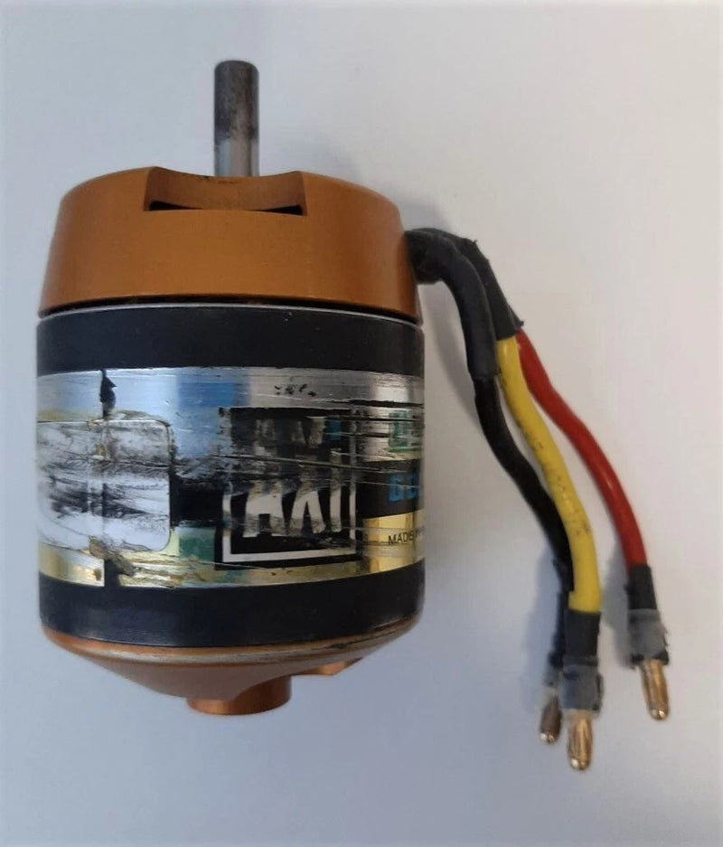 Brushless outrunner motor with brown housing and three color-coded wire leads