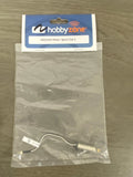 Replacement RC airplane motor with attached wire leads, in sealed protective bag