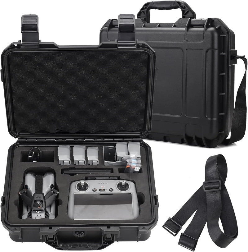 Waterproof hard carrying case with foam inserts, black, with shoulder strap and handle