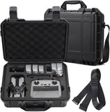 Waterproof hard carrying case with foam inserts, black, with shoulder strap and handle