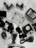 Action camera accessories job lot with black mounts and cases in plastic bags