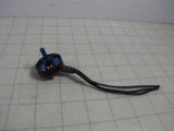 Blue brushless drone motor with black wire leads and connector