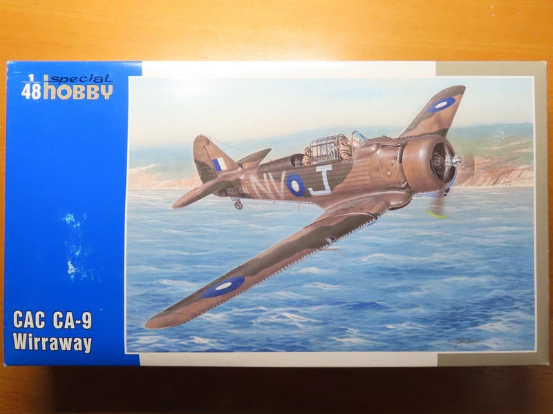 1/48 scale CAC CA-9 Wirraway model aircraft kit with box art, blue and tan