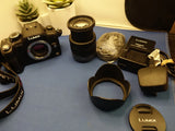 Panasonic Lumix G10, 14-42mm OIS, Lowepro bag, 3570 shutter count. Not sticky.