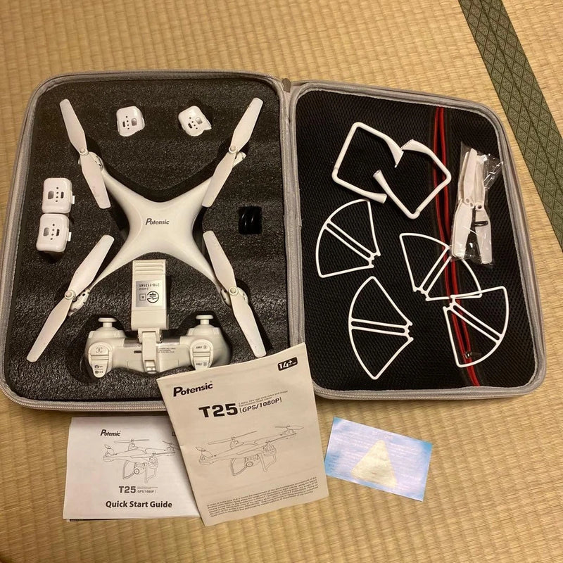 Potensic T25 drone kit in hard case with folding quadcopter, propellers, manual