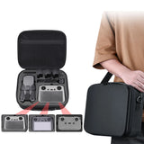 Black hard storage case with foam compartments and zip closure for drone remote
