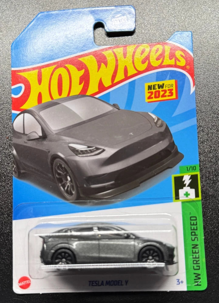 Hot Wheels Tesla Model Y die-cast car in blister pack, gray with black wheels