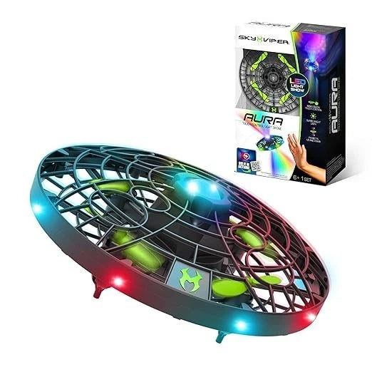 Light-up drone with teal hull, colorful prop guards, and multiple LED lights