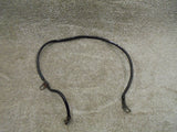 Battery earth cable with ring terminals, black rubber-coated wire