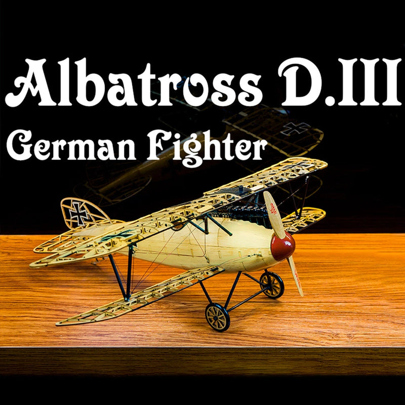 Wooden static airplane model with biplane wings, red nose, and yellow framework