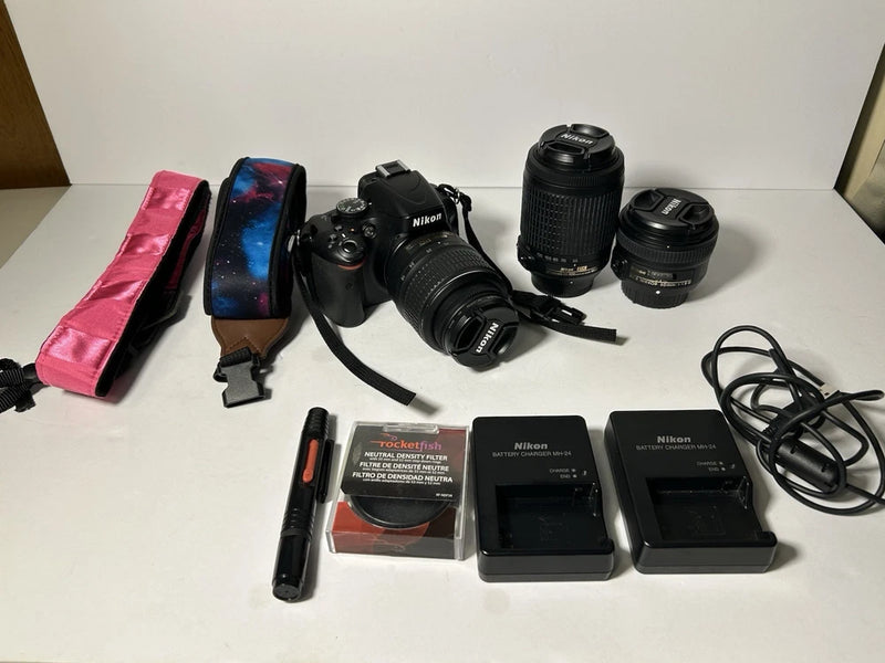 Nikon D5100 16.2MP Digital SLR Camera With Extra Lenses Charger Carrying Bag