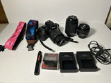 Nikon D5100 16.2MP Digital SLR Camera With Extra Lenses Charger Carrying Bag