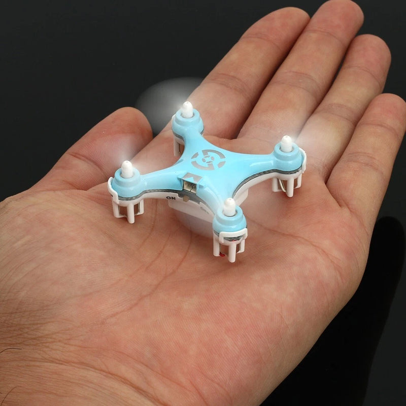 Cheerson blue RC quadcopter drone with four propellers, held in hand