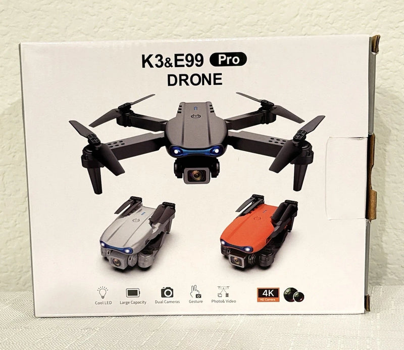 Professional RC drone product box with printed folding quadcopter and dual camera views