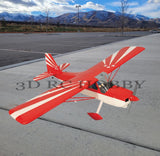 Red RC balsa airplane model with propeller, three-blade wings and tail on pavement