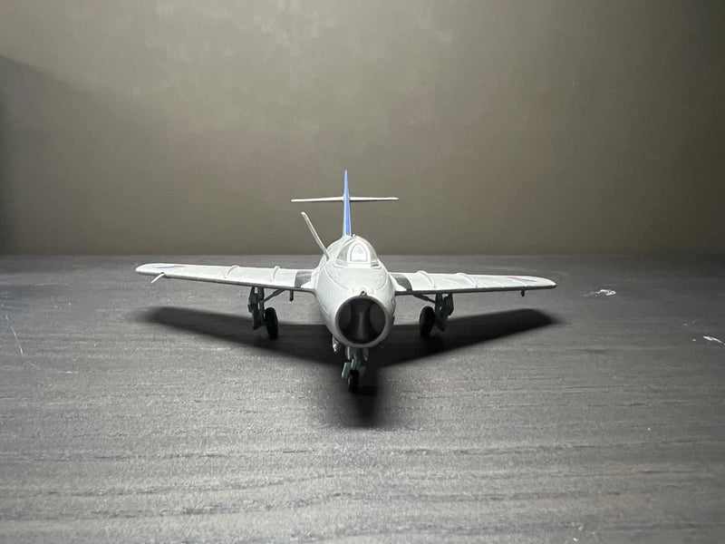 Hobbymaster 1/72 MiG-15BisR scale model airplane, white nose-forward front view