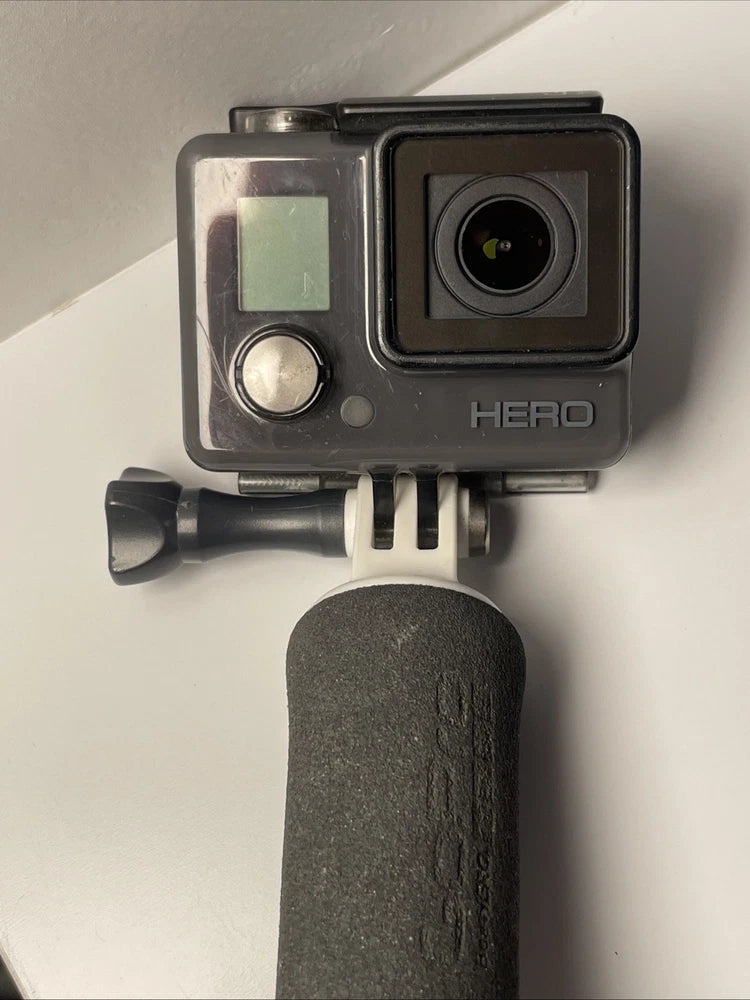 GoPro HERO action camera in waterproof case with selfie stick handle