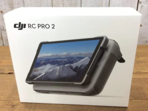 DJI RC Pro 2 remote controller with built-in screen, shown on retail box