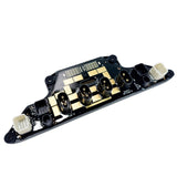 Black power distribution panel module with gold pads and several pin connectors
