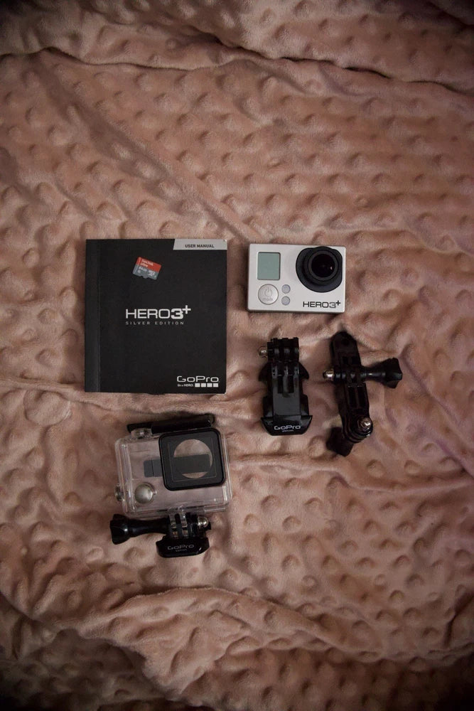 GoPro HERO3+ Silver Edition action camera kit with housing, mounts, and accessories