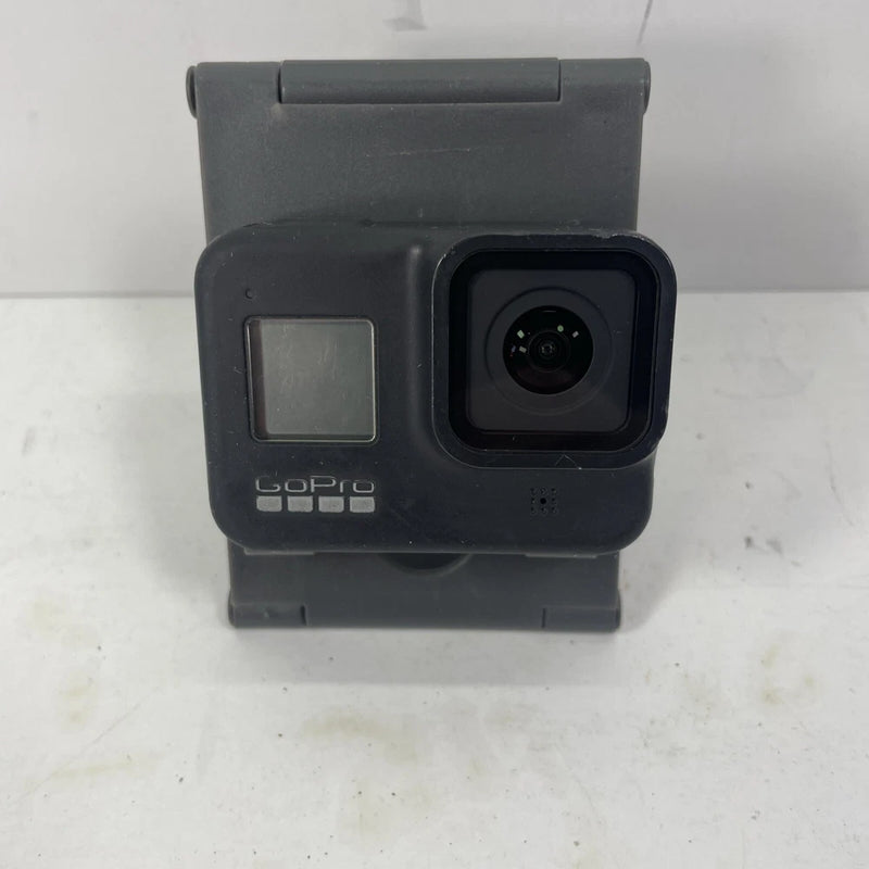 GoPro Hero 8 action camera in black case with front lens and small status screen