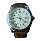 Guess men's round analog wristwatch with silver dial, date window, brown leather strap