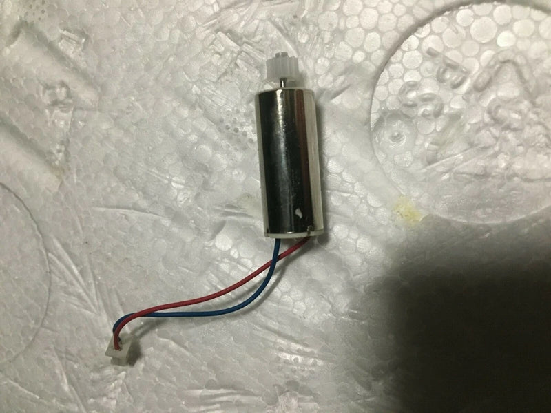 Plastic gear DC motor with black cylindrical housing, metal shaft, and red/blue wires