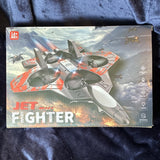 Jet fighter RC quadcopter drone box, gray and red with jet design