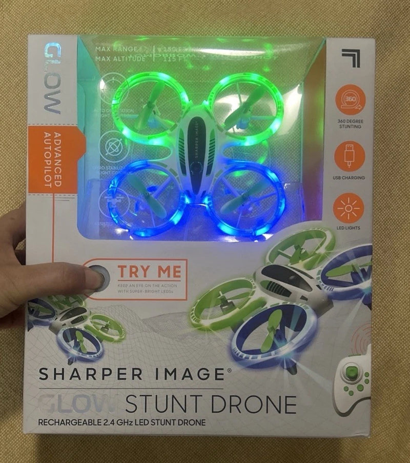 Rechargeable glow stunt drone box with green-blue LED quadcopter propellers