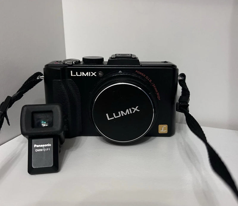Lumix Panasonic DMC - LX5 with DMW -LVF1 Viewfinder with leather case