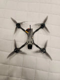 Custom 5-inch FPV race drone with four propellers and DJI O4 Air Unit RTF