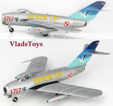 1:72 scale gray fighter jet model with blue tail and cockpit canopy, side markings