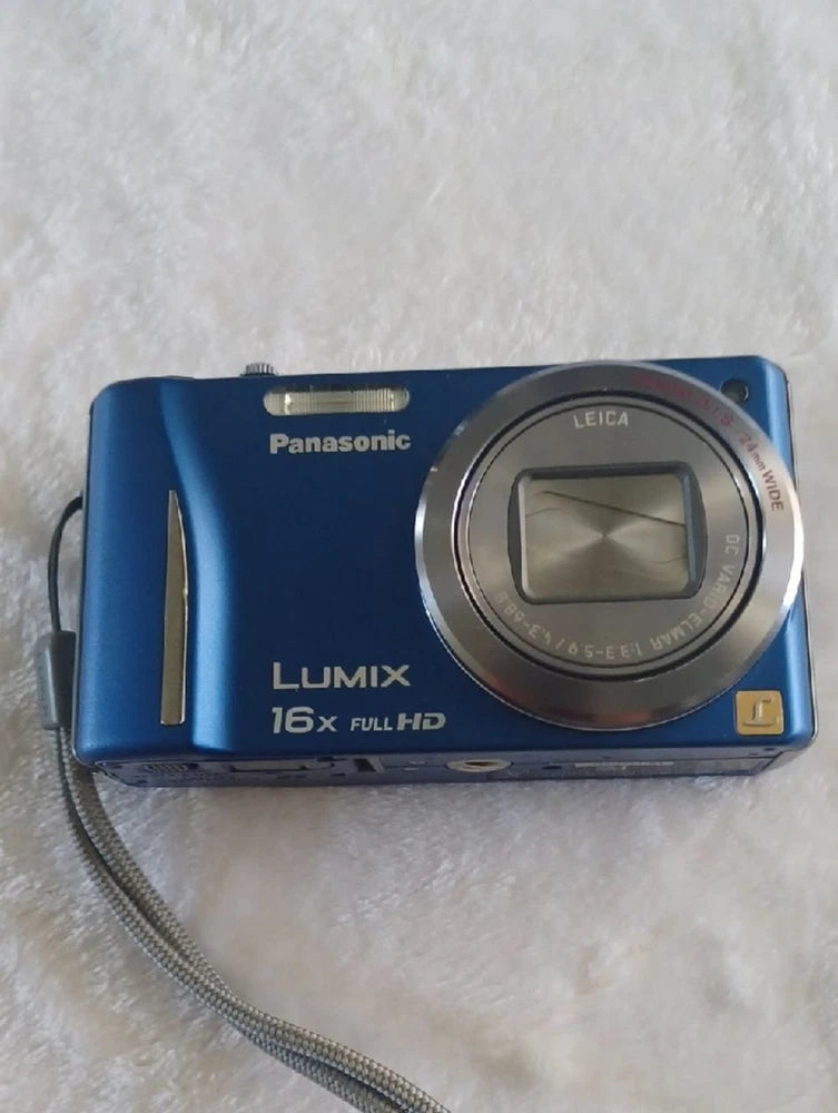 Blue Panasonic Lumix compact digital camera with Leica lens and LCD window