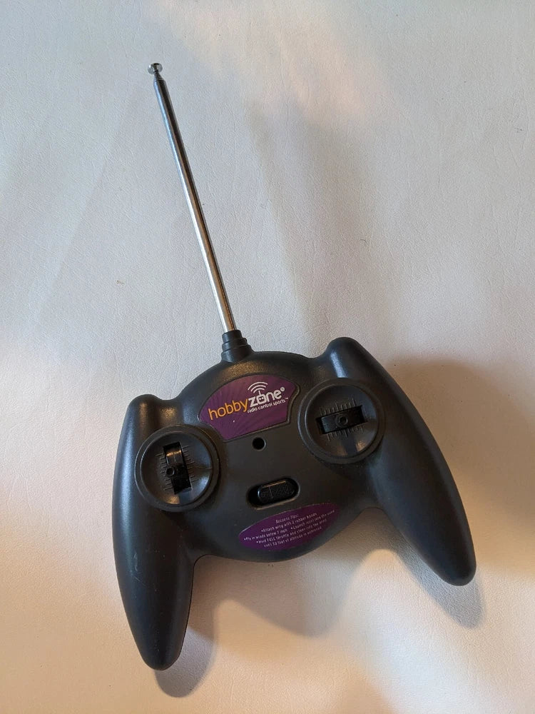 Hobby Zone radio control airplane remote transmitter with antenna and two thumbsticks
