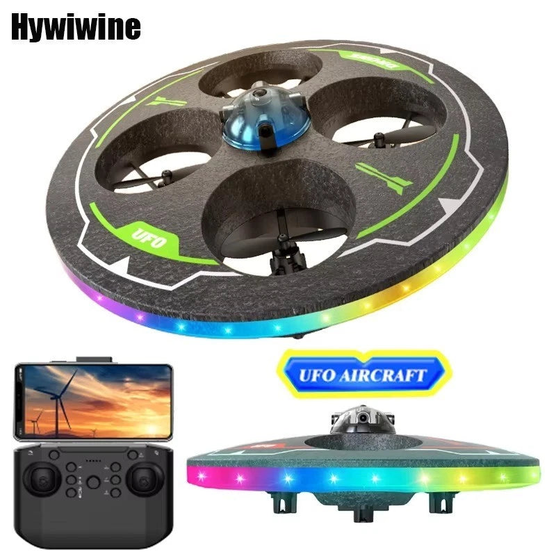 LED UFO foam drone with green/black circular body and handheld remote controller