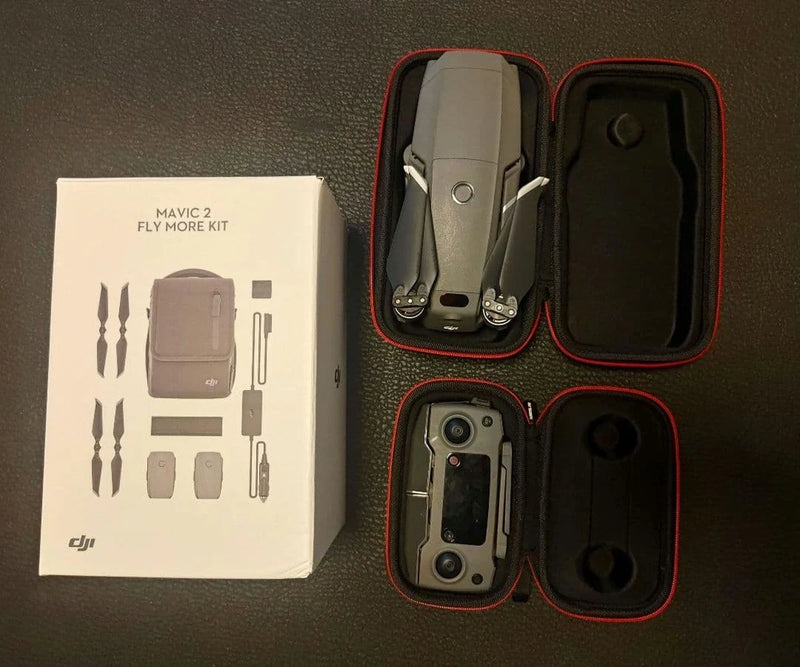 DJI Fly More Kit case with red-trim compartments and included accessories
