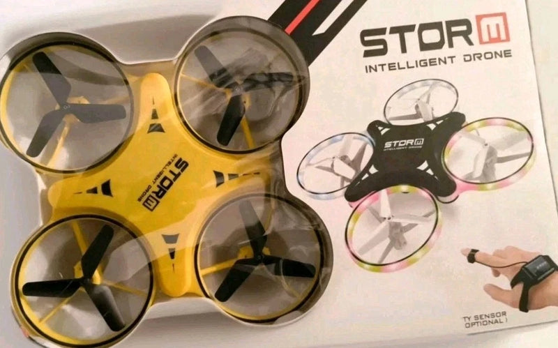 Yellow quadcopter drone with four propeller guards