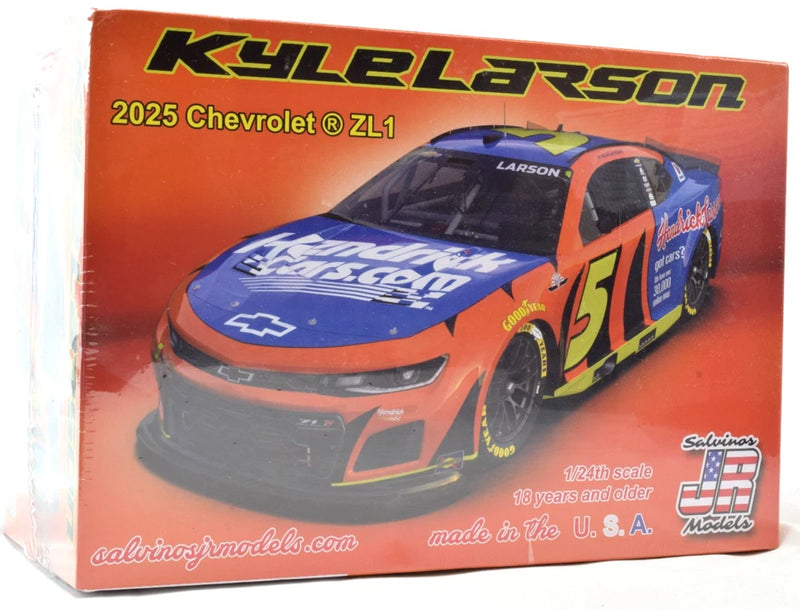 Race car model kit box with orange-and-blue Kyle Larson Camaro artwork