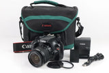 Canon EOS Rebel T3 digital SLR camera with 18-55mm lens and carrying case