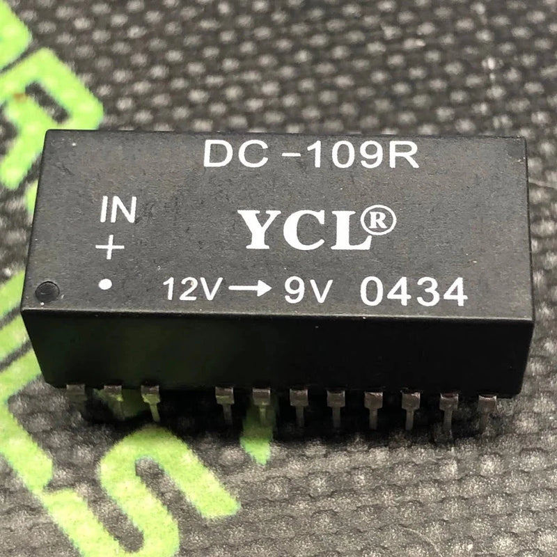 Black 24-pin DIP DC-109R YCL DC/DC converter with 12V in and 9V out markings