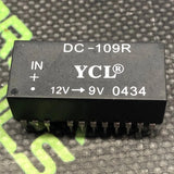 Black 24-pin DIP DC-109R YCL DC/DC converter with 12V in and 9V out markings