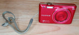 Red Fujifilm FinePix JX680 compact digital camera with 5x zoom lens and neck strap
