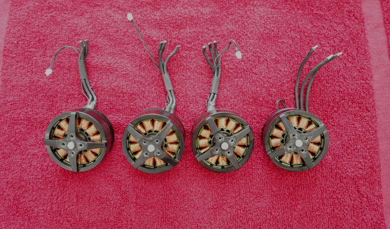 Drone motor assembly set with four circular motors and attached wiring