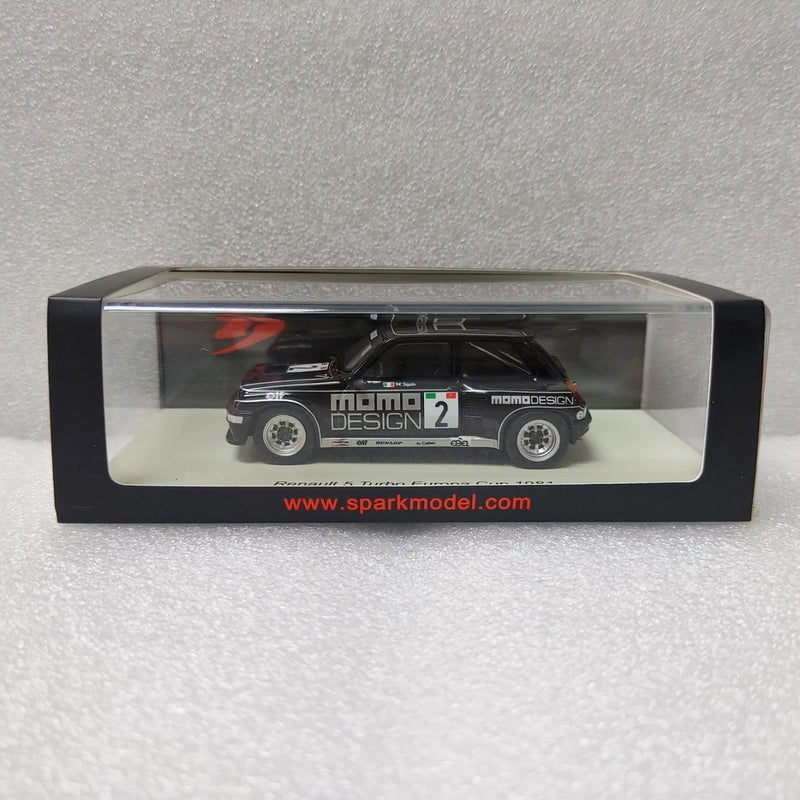 Black Renault 5 race car model in clear display box, sponsor decals and #2 on door