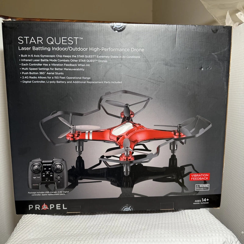 Propel Star Quest quadcopter drone in retail box, red and gray, 2.4GHz control