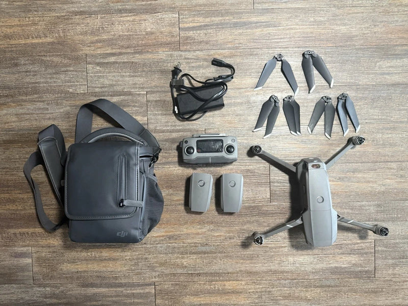 Drone accessories kit: carry bag, batteries, propellers, charger cable