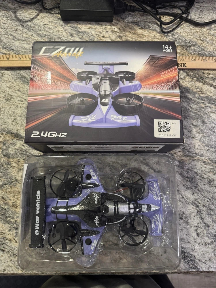 RC racing quadcopter drone in retail box, purple and black, 2.4GHz