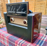 Murphy valve radio with tuning scale window and two brown control knobs